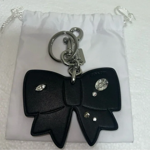 COACH Bow Bag Charm Gem Ribbon Black Leather - Picture 1 of 4